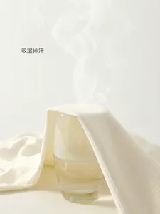 Body bébé en coton côtelé respirant montrant l'évacuation de la vapeur pour l'air