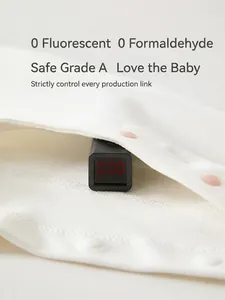 Safety tested A-class white baby jumpsuit made of soft organic combed cotton