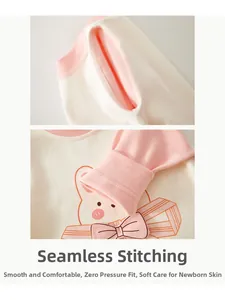 Detail of smooth flatlock stitching and ribbed cuffs on soft cotton baby romper