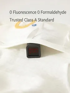 Newborn white pure cotton baby top showing safety test result for zero fluorescence and formaldehyde