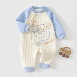 Detailed view of the snap buttons and knit texture on this blue elephant baby romper