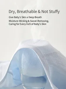 Breathable light blue cotton baby vest shown with steam to demonstrate airflow