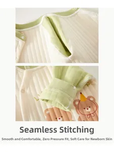 Detail view of quilted padded baby romper showing smooth seams and cute bear pattern
