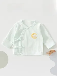 Detail of mint green long sleeve baby kimono top with cute rabbit embroidery applique