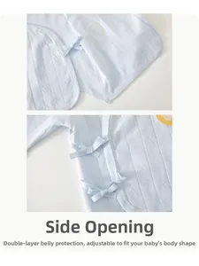 Detail of baby cotton side-snap shirt with bow ties and double-layer belly protection