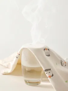 Tutina neonato traspirante in cotone con panda che mostra il test del vapore