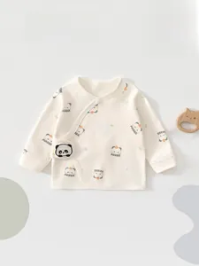 Detail of newborn cotton baby kimono wrap with panda print and soft snap closures