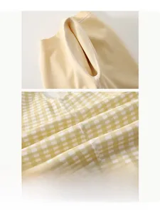 Detail view of the flat boneless stitching technology on soft baby bodysuit fabric