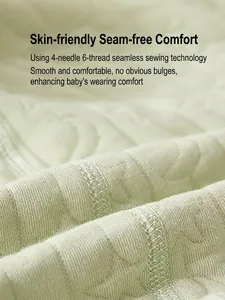 Quilted light green baby romper in pure cotton with flat 4-needle 6-thread seamless stitching