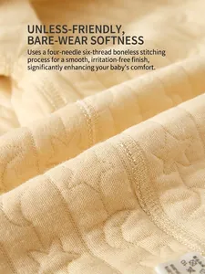 Quilted warm baby romper in beige featuring star jacquard and seamless 4-needle 6-thread stitching