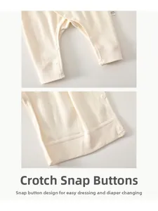 Detail of baby romper snap closure and ribbed cotton fabric for easy diaper changes
