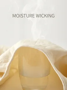 Breathable thermal cotton newborn bodysuit showing steam permeability and soft texture