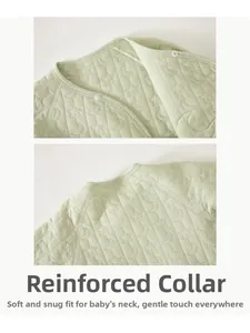 Close-up of the hemmed neckline and soft quilted fabric on baby winter romper