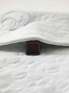 Body matelassé bleu pour bébé avec motifs d'étoiles, certifié sans fluorescence et sécurisé