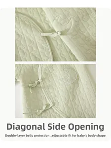 Detail of baby quilted romper featuring adjustable ties and double-layer belly protection