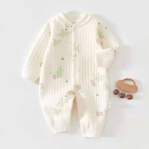 Close-up of baby romper showing soft ribbed cotton texture and cute rabbit print