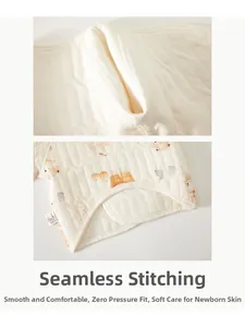 Detailed view of seamless stitching and quilted cotton texture on a warm newborn top