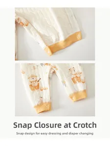 Détails de la grenouillère bébé en coton matelassé avec boutons-pression pour le change