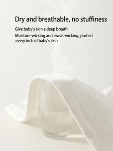 Breathable white cotton ribbed baby romper showing moisture-wicking fabric texture