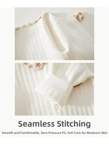 Detailed close-up showing boneless sewing process on pure cotton newborn baby romper