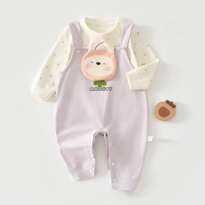 Close-up of baby girl outfit featuring a 3D rabbit patch and snap buttons at the crotch
