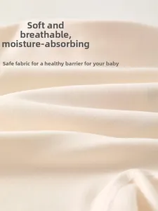 Close-up of soft cashmere silk fabric texture for infant romper, breathable and gentle