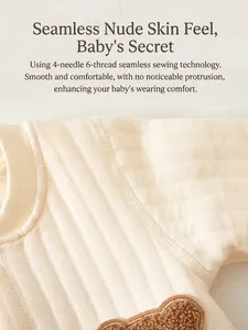 Body matelassé pour nouveau-né en coton crème avec coutures plates et écusson d'ours