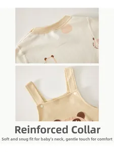 Detail view of cotton baby outfit showing soft neck lining and easy snap fasteners