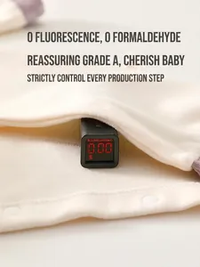 Organic cotton baby romper with cashmere silk showing zero fluorescence safety test result