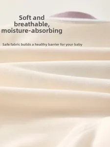 Close-up of soft cashmere silk fabric showing fine diagonal weave for baby winter jumpsuits