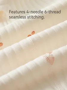 Soft organic cotton baby romper featuring a seamless peach print design for maximum comfort