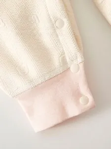 Baby warm romper featuring cute bear patterns and safe food-grade resin snap buttons