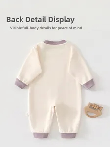 Detailed back view of a soft baby bodysuit featuring lavender ribbed cuffs and cotton fabric