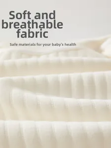 Macro view of soft breathable ribbed cotton fabric for newborn baby rompers