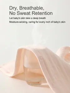 Breathable pink cotton baby romper showing excellent air permeability and soft texture