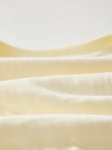 Macro shot of breathable quilted cotton fabric texture for baby warm rompers