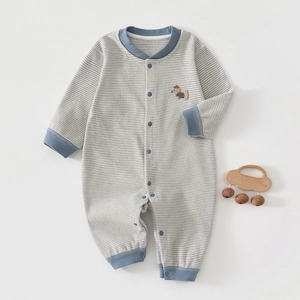 Detail of newborn striped thermal bodysuit with dog embroidery and button closure