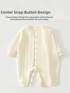 Detailed view of baby romper featuring snap buttons and 3D striped cotton texture