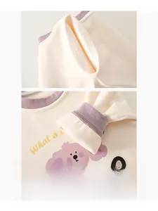 Detail of boneless sewing process on soft baby cashmere silk thermal onesie