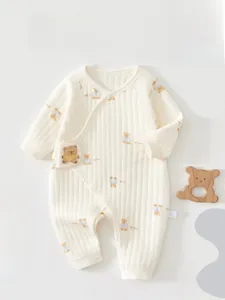 Detail of baby quilted cotton bodysuit featuring cute bear prints and 3D applique