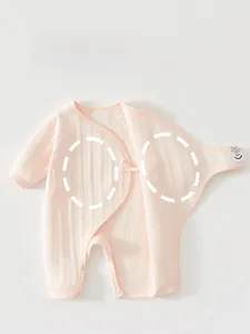 Detail of baby quilted onesie showing double-layer belly protection and snap crotch