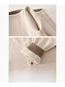 Detail of boneless stitching on striped cashmere newborn romper for comfort