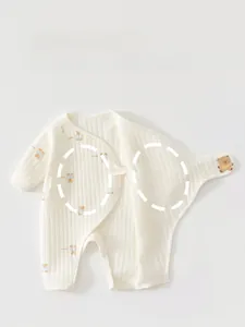 Detail of ribbed cotton baby romper with double-layer belly protection and bear print