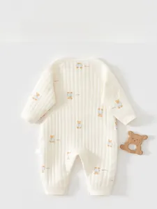 Close-up of baby romper back view showing ribbed cotton fabric and cute bear patterns