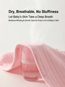 Pink quilted cotton baby romper showing breathable fabric with steam penetration effect