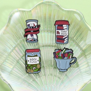 Set of 4 creative book lover enamel pins with hourglass, book fund jar, and tea cup