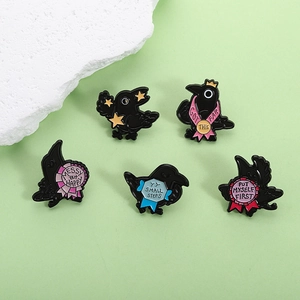 Set of five funny black crow enamel pins with motivational quotes and gold star accents