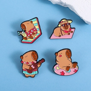 Set of four cartoon Capybara enamel pins showing summer vacation scenes and beach themes