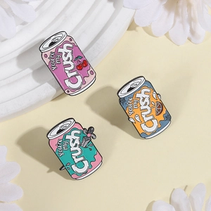 Three creative soda can enamel pins with 'You're my Crush' text on a light yellow background