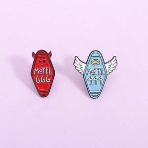 Creative enamel pins set featuring Motel 666 devil and Motel 444 angel badge designs